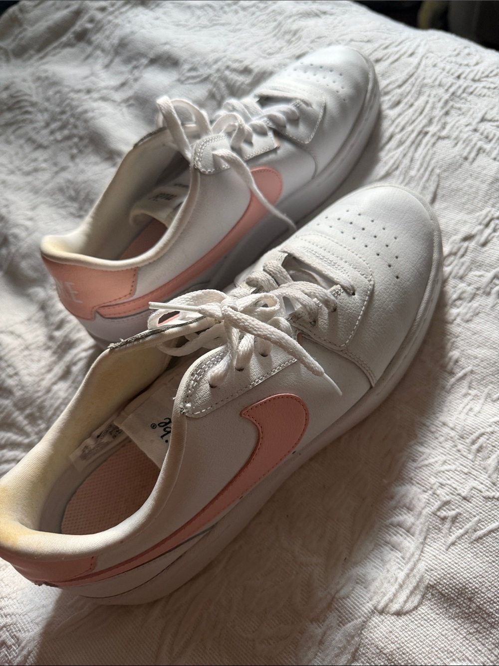 Nike White Low-Top Sneakers with Pink Swoosh